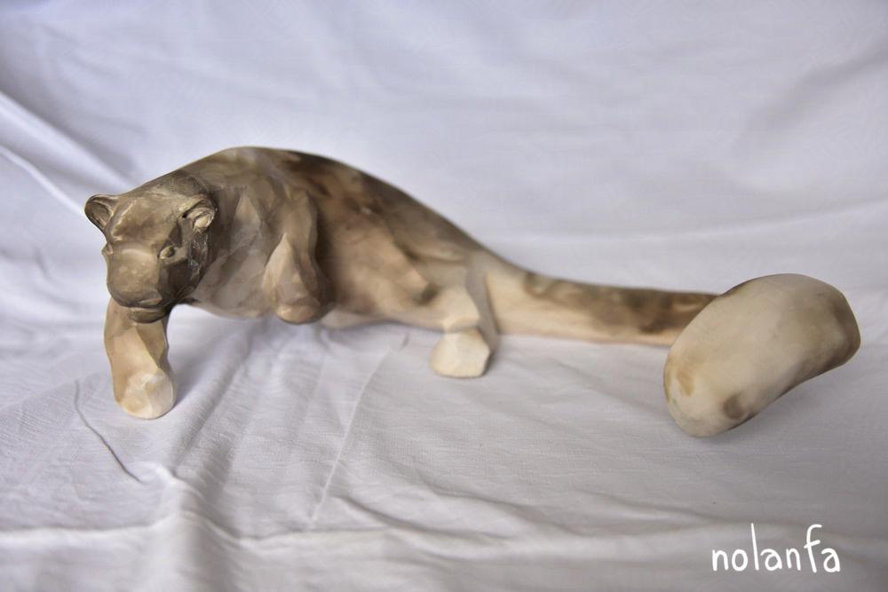 snow leopard B leaping: fullbody three quarters