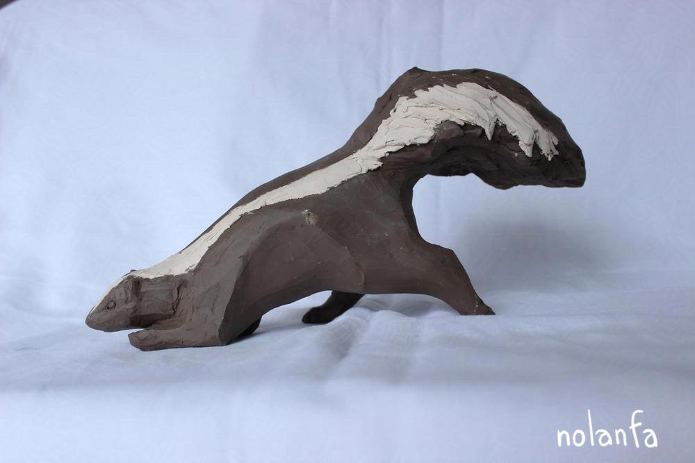 Skunk: facing left