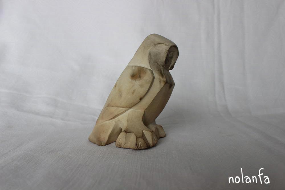 owl A standing: facing right