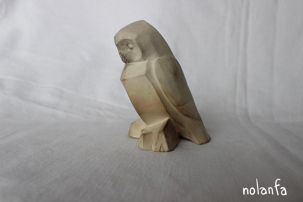 owl A standing: facing left