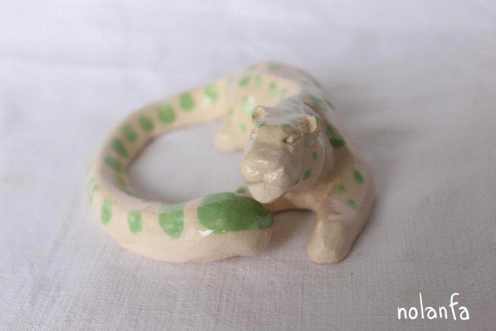 light green panther face