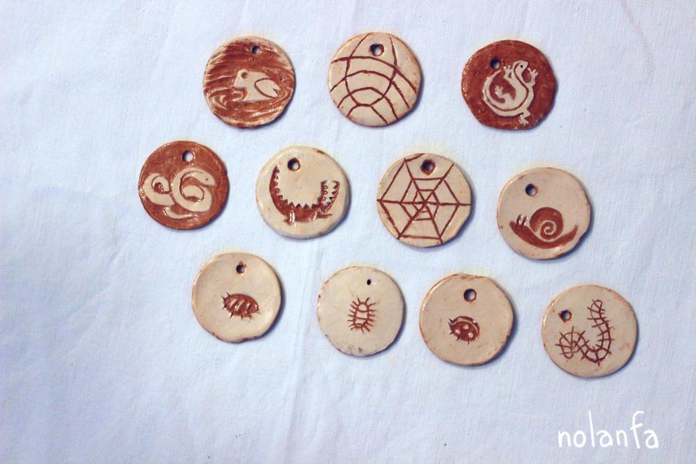 critters medaillons: frog, trilobyte, lizard, snake, crocodile, spiderweb, snail, pillbugPerspective, pillbugLines, ladybug, centipedeLines