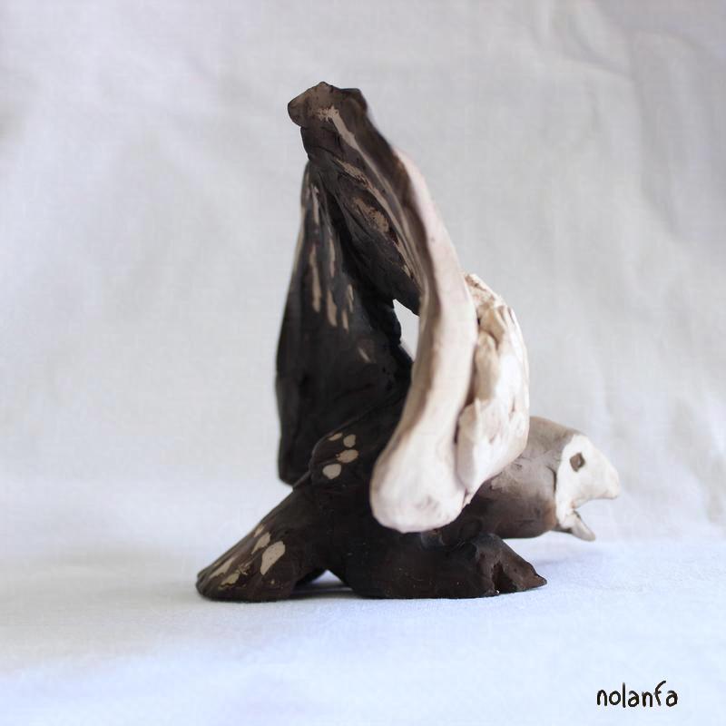 small smoked owl