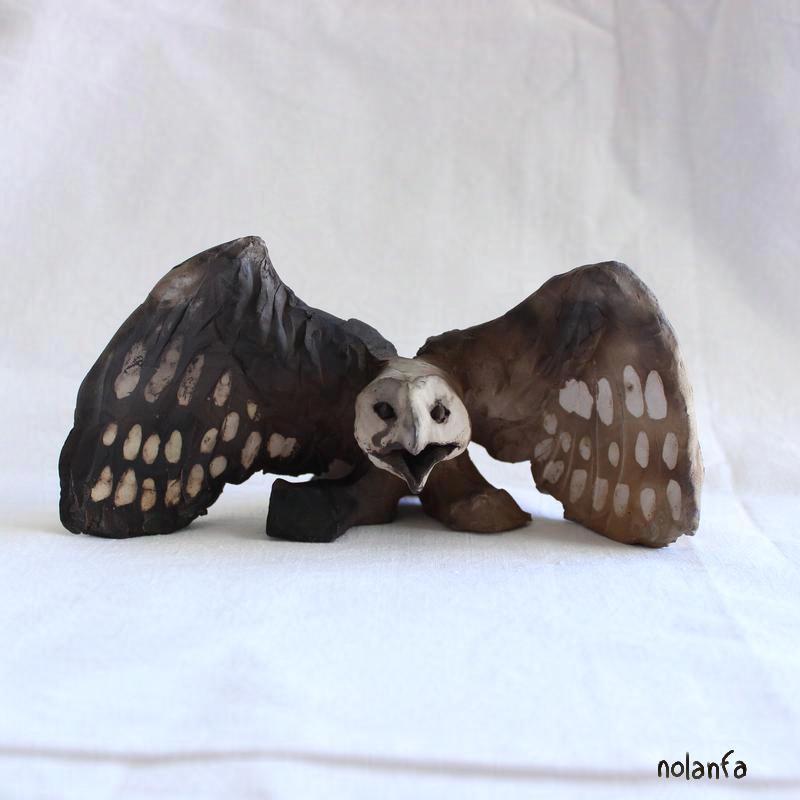 small smoked owl